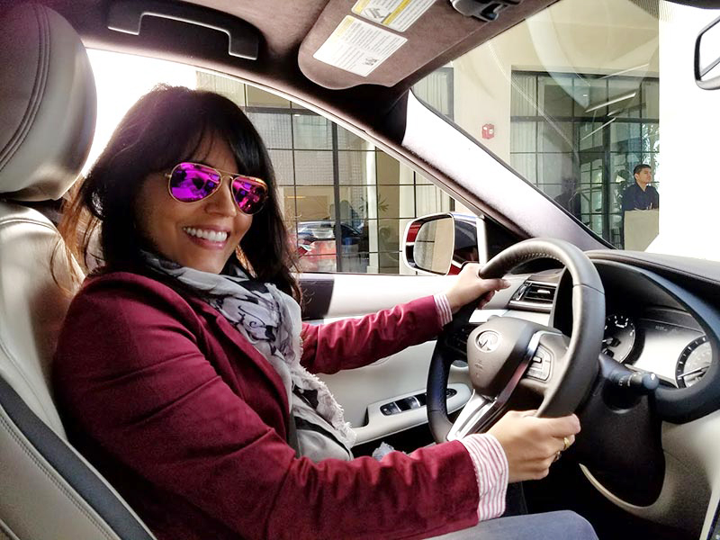 Mar Yvette in the driver's seat of the 2019 Infiniti QX50